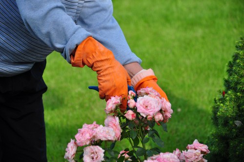 Gardening team finishing a safe, insured maintenance job